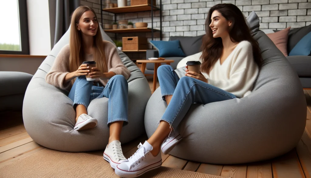 Photo of a well-lit room where a female friend is sitting comfortably in a Lovesac bean bag, while another female friend is enjoying her time in a Chill Sack bean bag. Both are chatting and laughing, with a casual atmosphere around.